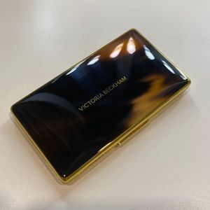 Victoria Beckham smoky eye brick in signature